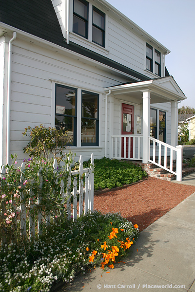 house in Mendocino with California poppies - Eschscholzia californica