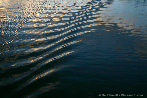 boat wake on water surface - photographer Matt Carroll