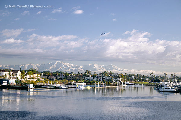 Marina Pacifica with backdrop of snow-covered San Gabriel Mountains