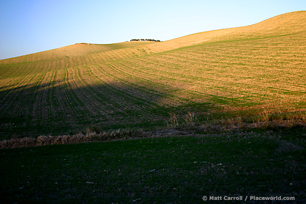 bare, green hill in afternoon sun, Andalucía