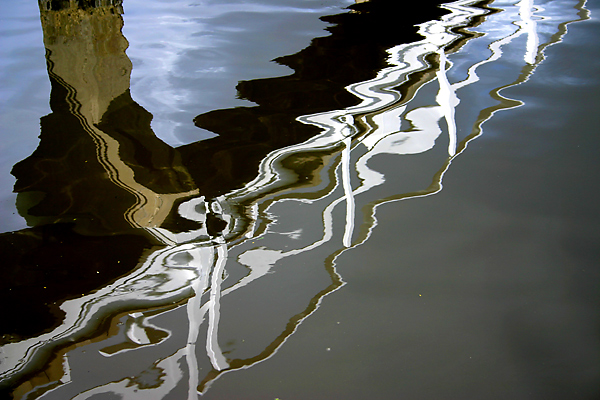 Reflection of dock on north shore of Naples Island - photographer Matt Carroll